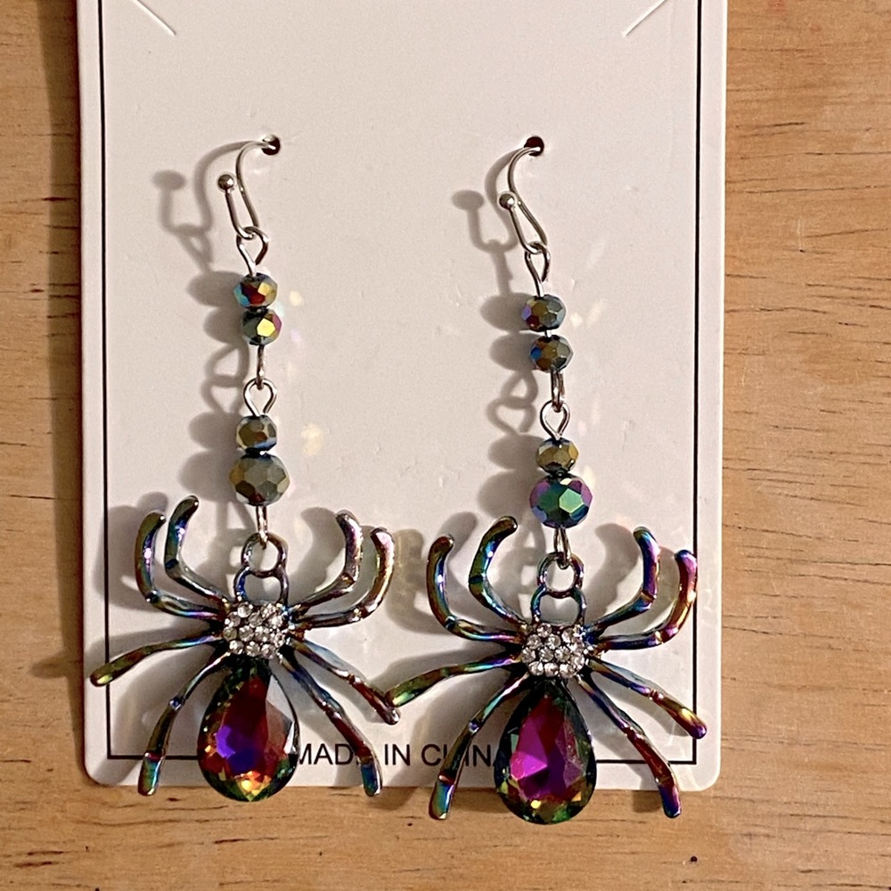 Sparkling teardrop spider fashion earrings. Brand new.